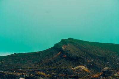 Scenic view of mountains against clear sky