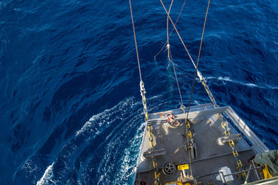 High angle view of ship sailing in sea