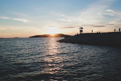 Scenic view of sea against sky during sunset