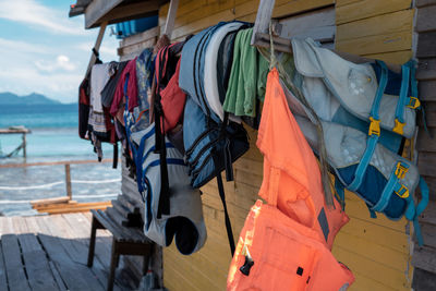 Life jackets or life preservers drying out in a sunny day.