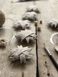 High angle view of paper decorations on table