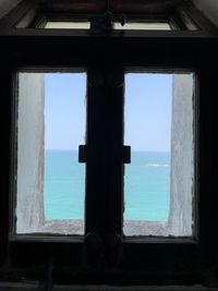 Sea seen through window