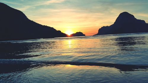 Scenic view of sea at sunset