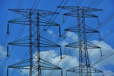 Electricity tower with beautiful clouds and blue sky