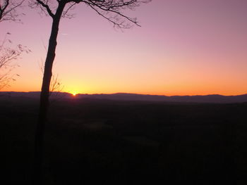 Scenic view of sunset over landscape