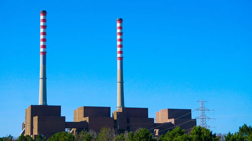 Low angle view of building against blue sky