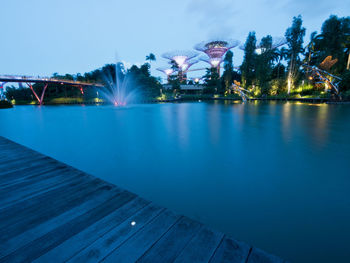 Scenic view of waterfall against sky