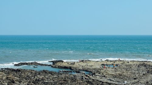 Scenic view of sea against clear sky