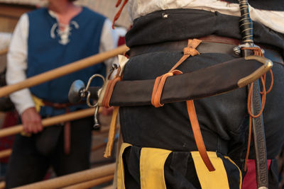 Close-up of luggage with weapon