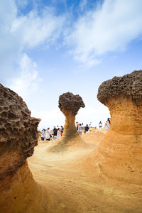 Group of people on rock formation