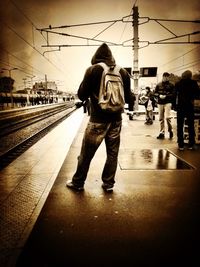 Person walking on railroad track