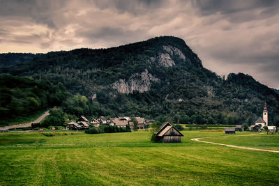 Scenic view of landscape and mountains against sky