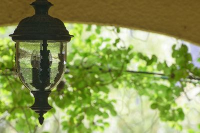 Low angle view of lighting equipment hanging outdoors