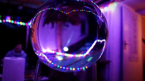 Close-up of illuminated crystal ball