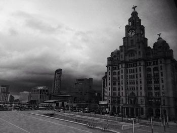 View of city against cloudy sky