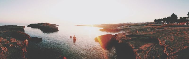 Scenic view of sea at sunset