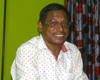 Portrait of smiling mid adult man