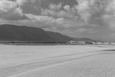 Scenic view of beach against sky