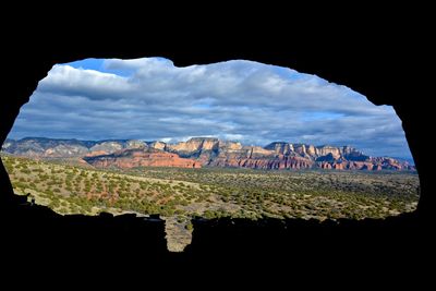 View of landscape against cloudy sky