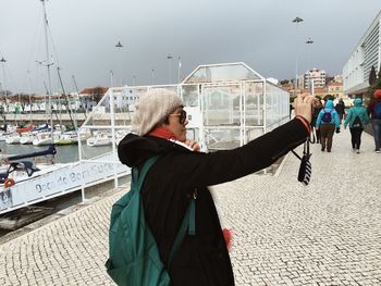 Woman standing in city