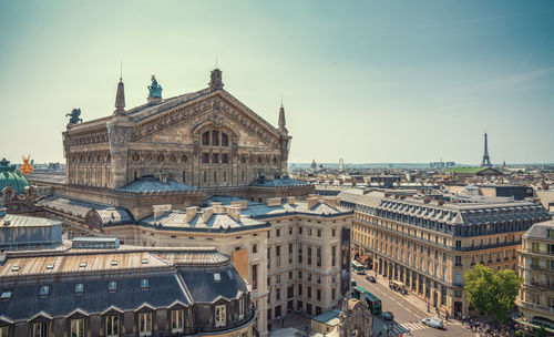 Buildings in city against sky