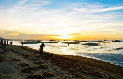 Scenic view of sea at sunset