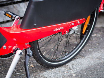 Close-up of bicycle parked on road