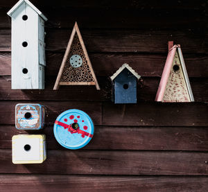 Directly above shot of birdhouses on wooden table