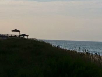 Scenic view of sea against sky at sunset