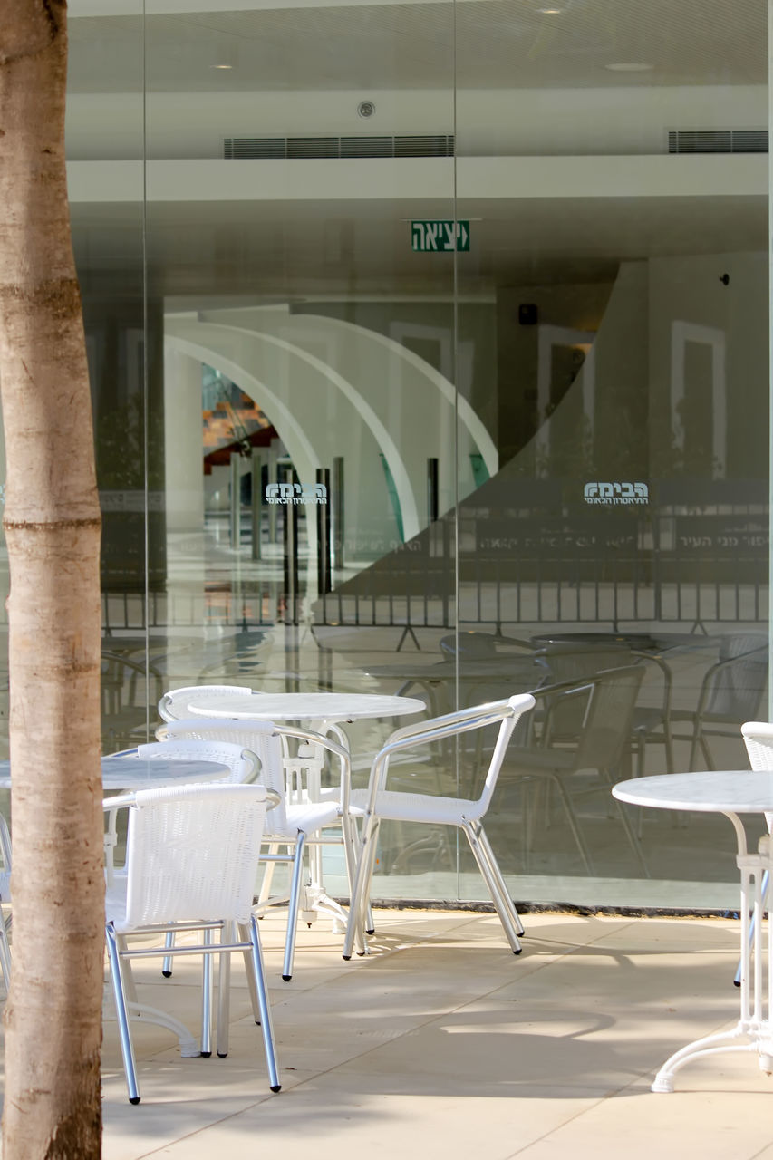 chair, seat, interior design, architecture, table, built structure, furniture, no people, indoors, empty, business, cafe, absence, floor, building, room