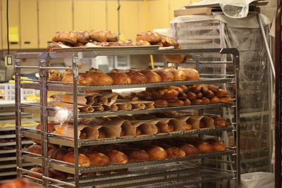 Close-up of baked goods on rack in bakery