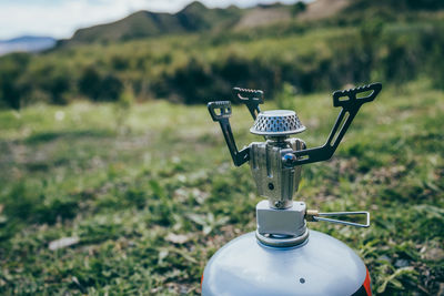 Close-up of bicycle on field