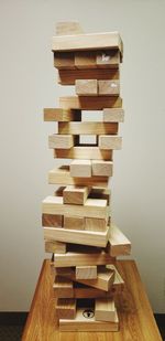 Close-up of stack of wooden table