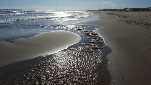 Close-up of sand at beach