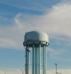 Low angle view of water tower against sky