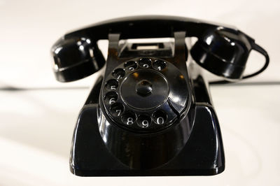 High angle view of camera on white background