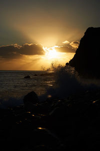 Scenic view of sea against sky during sunset