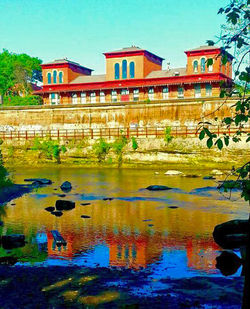 View of canal along buildings