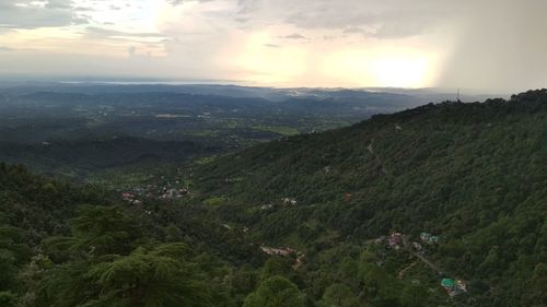 Scenic view of landscape against sky during sunset