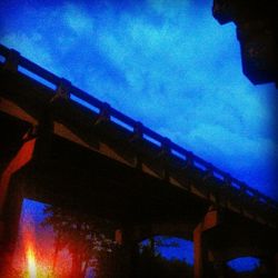Low angle view of illuminated building against clear sky