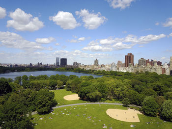 Buildings in city against sky