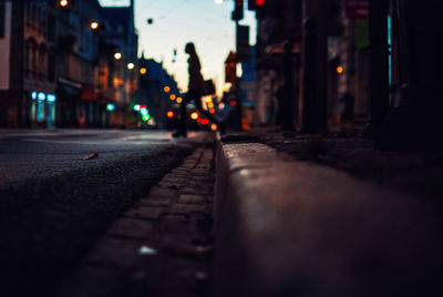 Cars on city street at night
