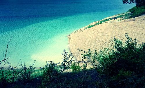 Scenic view of sea against blue sky