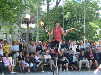 Group of people sitting in park