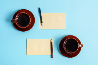 High angle view of coffee cup on table