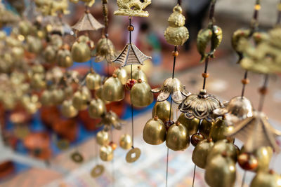 Close-up of decoration hanging for sale in market