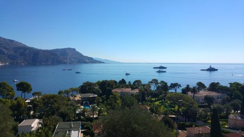 Scenic view of sea against clear blue sky