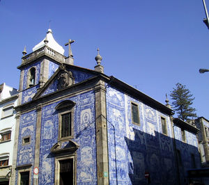 Low angle view of building against blue sky