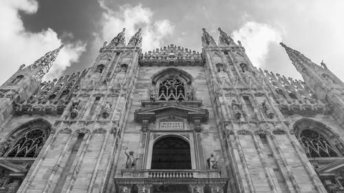 Low angle view of milan cathedral against sky