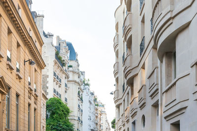 Low angle view of buildings against clear sky